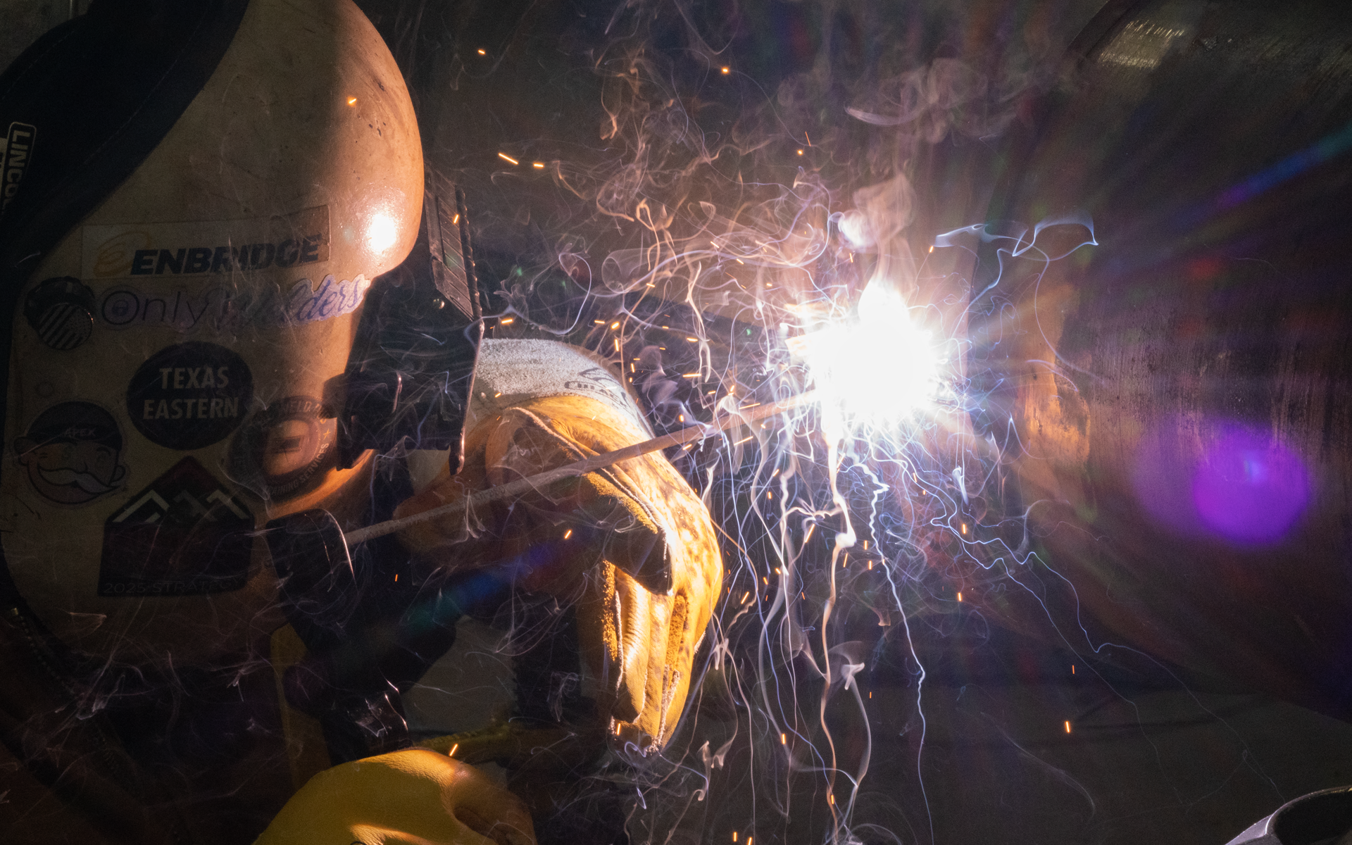 Up close image of stick welding.